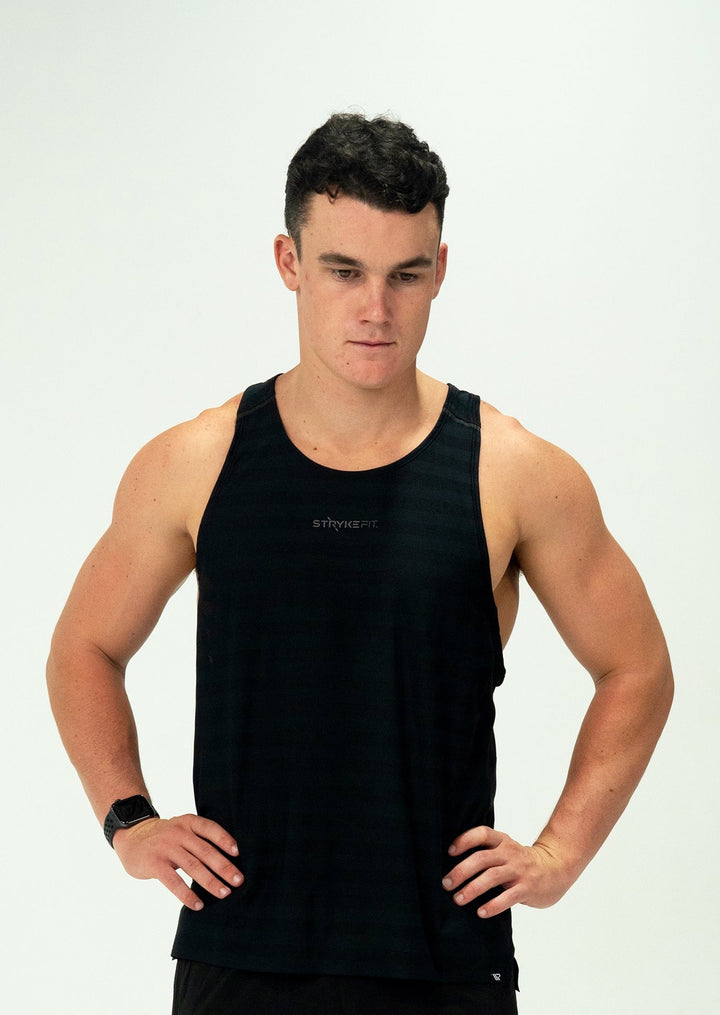 The SPEED RUN SINGLET is a lightweight, breathable,, and moisture-wicking top designed to help you reach your full potential. The racerback design allows you to move freely with each stride, ensuring maximum comfort and flexibility. Whether you're hitting the track, running a marathon, or simply going for a jog, the SPEED RUN SINGLET is the perfect for every run.