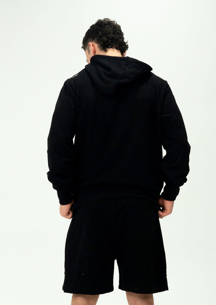 The SF HOODED FLEECE is an essential winter hoody that belongs in every wardrobe. Made from premium brushed fleece, it offers the perfect combination of comfort and style, perfect for the winter months.