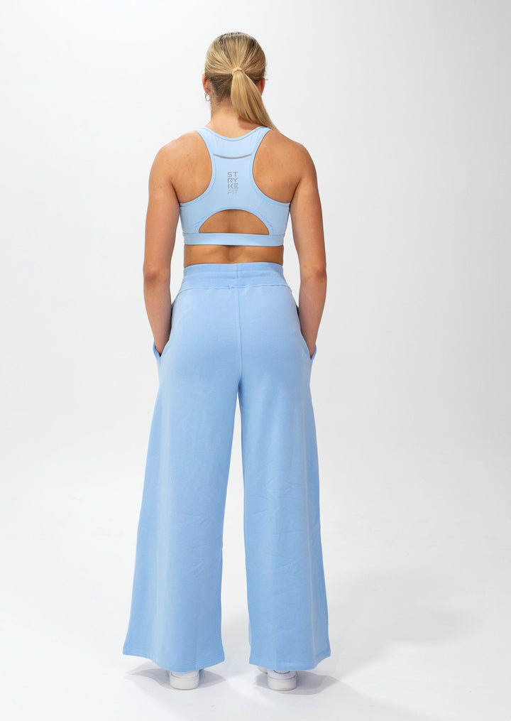 Our ACTIVE FLEECE TRACKPANTS is the perfect staple piece for your pre and post-training session.  These trackpants are a relaxed high waist fit with a rib elasticated waistband, drawstring, side pockets, and beautiful soft brushed fleece fabric.  Complete the matching set with our Core Fleece Hood.