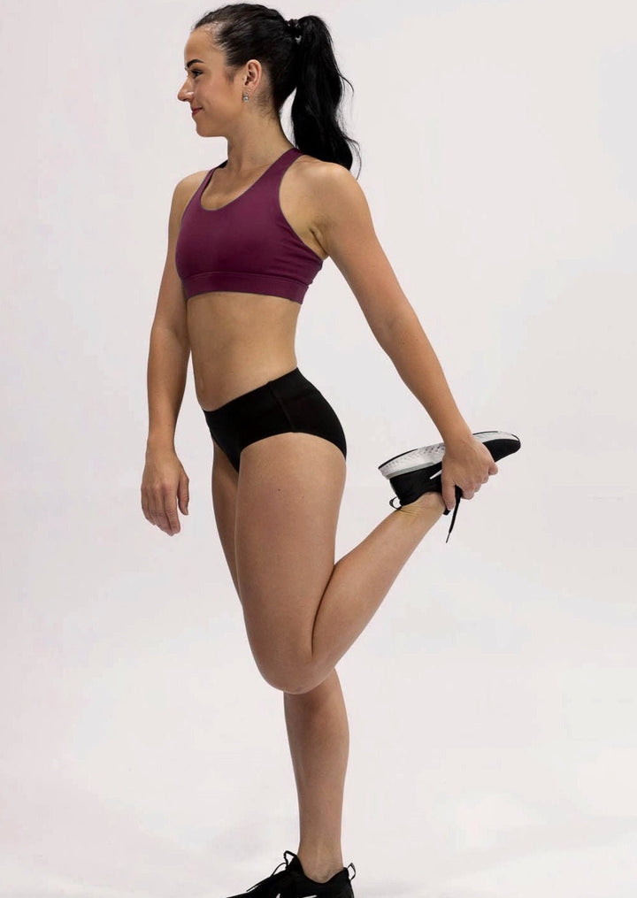 INSPIRE RUNNING CROP TOP has been designed with featured multi cross back straps. This crop top is for the girl who likes to look good while running or working out in a medium impact top. With a reflective back logo print you can be seen while running in low light.