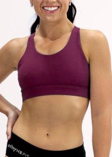 INSPIRE RUNNING CROP TOP has been designed with featured multi cross back straps. This crop top is for the girl who likes to look good while running or working out in a medium impact top. With a reflective back logo print you can be seen while running in low light.