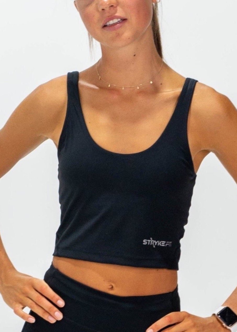 The INTERVAL CROP TOP is a longer-length crop top with a built-in bra for extra support and added coverage. Designed for high-impact training this top is a great addition to any wardrobe. Lightweight, quick-dry fabric, Moisture-wicking technology, High impact fit, Built-in shelf bra, reflective logo to enhance visibility in low light are some of the features.