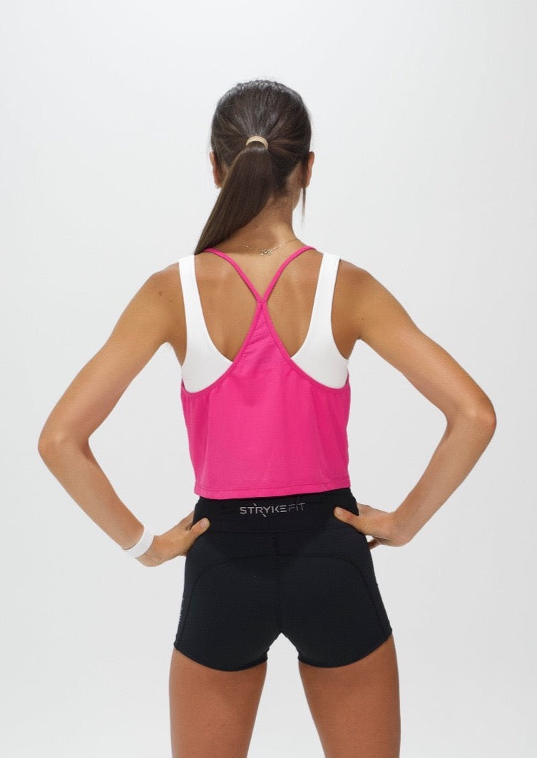 The TEMPO CROPPED RUNNING SINGLET is lightweight, breathable, and moisture-wicking allowing you to perform at your highest potential. The racerback design allows your arms to move naturally through your strides. You can't go past Fuchsia Pink this season.