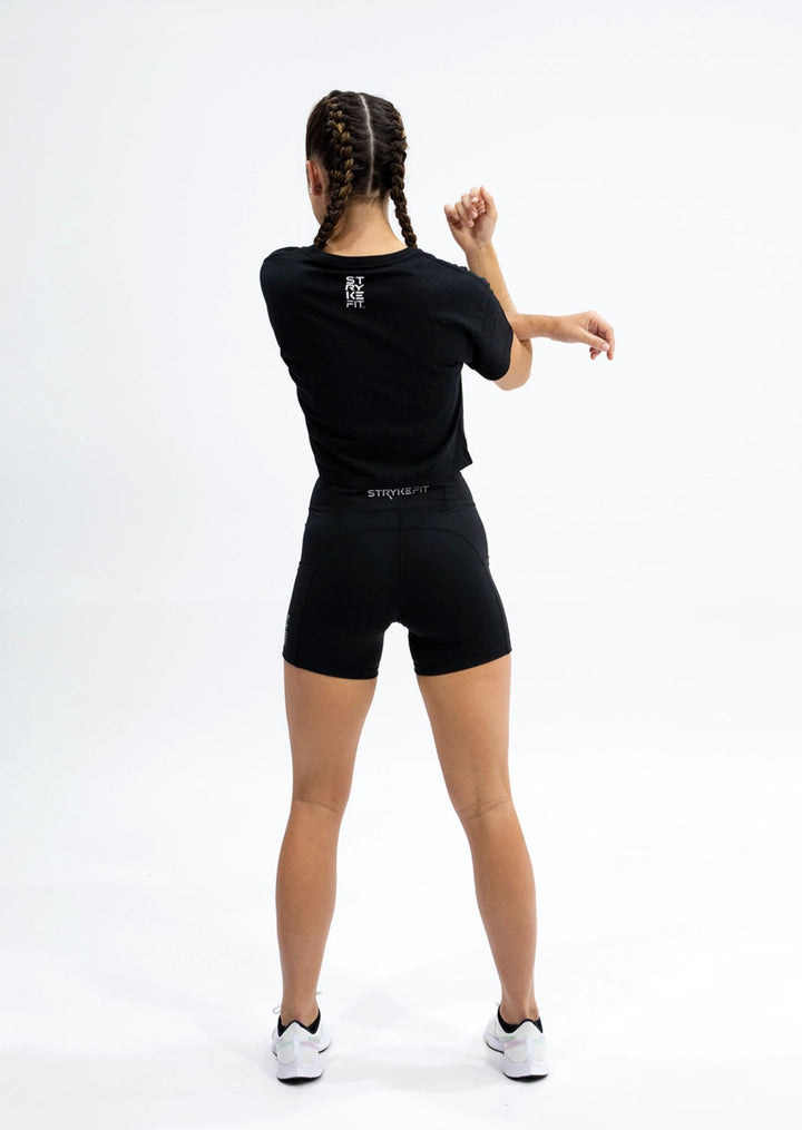 FOCUS CROP TEE is the perfect t-shirt to pair with all your Stryke activewear. The classic crop style tee is made from breathable combed cotton fabric which offers exceptional comfort. The Focus Crop Tee matches back to the Trek Running Short, the perfect garment for any wardrobe.