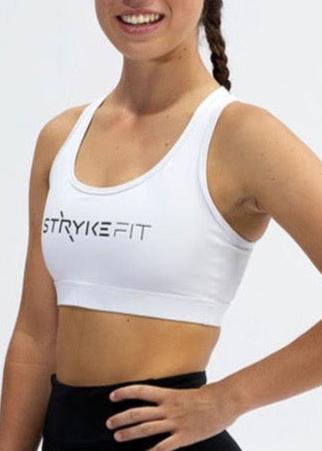 The STRYKE RUNNING CROP TOP is designed with a back phone pocket enabling you to carry your phone effortlessly while wearing, allowing you to listen to music, podcasts, or even just having it on you for personal security. The racerback straps follow the curve of your shoulder blades to allow your arms to move freely while offering maximum support. The STRYKE RUN CROP TOP is made from quick-dry, and breathable fabric with moisture-wicking technology, perfect staple for any athlete.