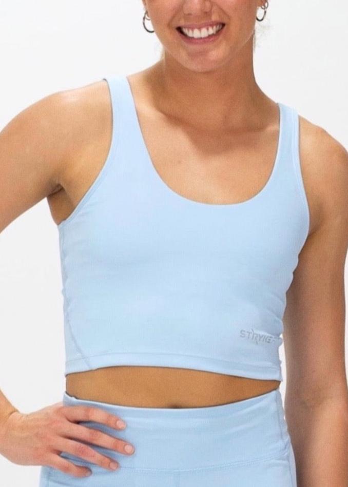 The INTERVAL CROP TOP is a longer-length crop top with a built-in bra for extra support and added coverage. Designed for high-impact training this top is a great addition to any wardrobe.