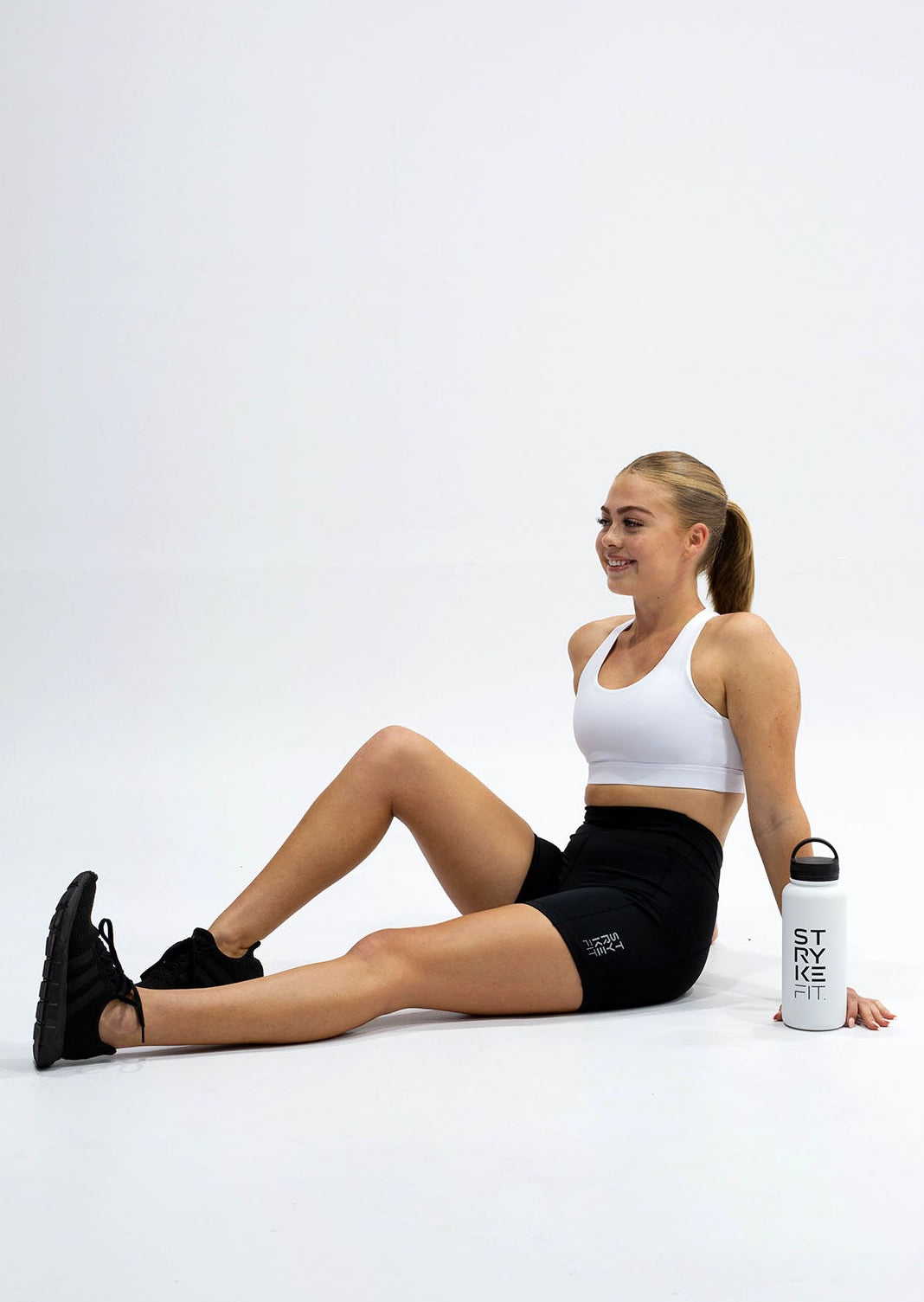 INSPIRE RUNNING CROP TOP has been designed with featured multi cross back straps. This crop top is for the girl who likes to look good while running or working out in a medium impact top. With a reflective back logo print you can be seen while running in low light.