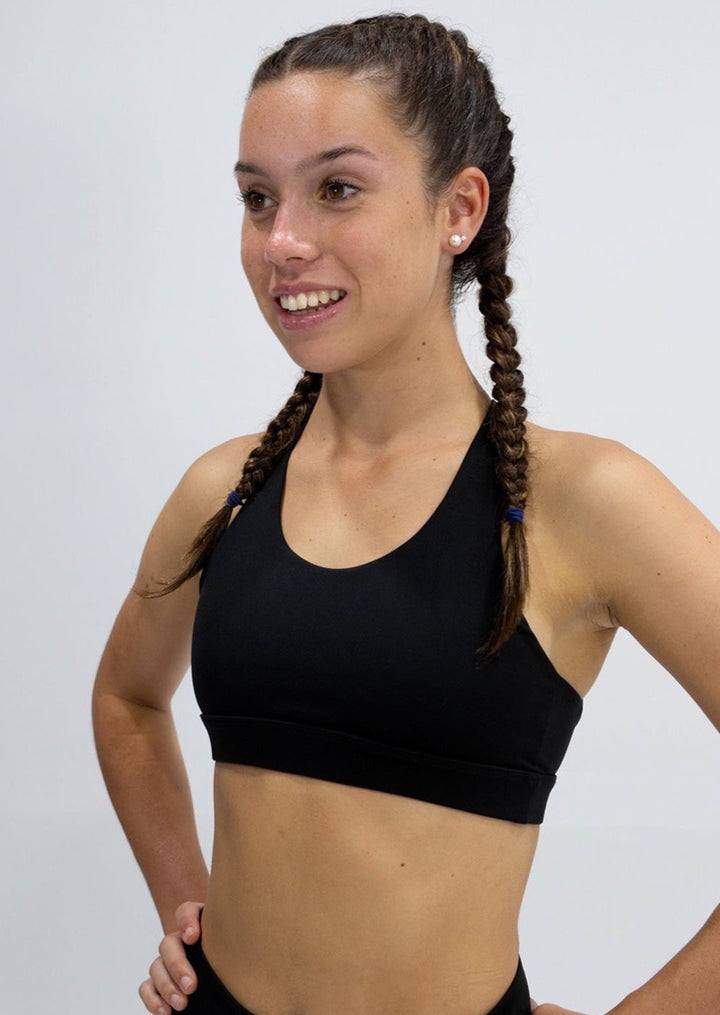 INSPIRE RUNNING CROP TOP has been designed with featured multi cross back straps. This crop top is for the girl who likes to look good while running or working out in a medium impact top. With a reflective back logo print you can be seen while running in low light.