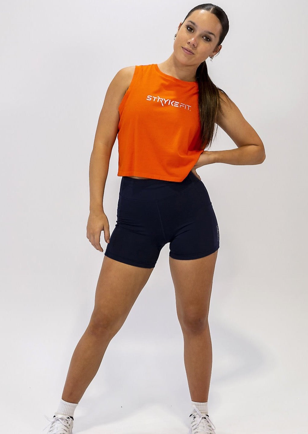 SQUAD SLEEVELESS TANK is made from a soft combed cotton jersey and featuring a crop tank style, this garment will become your next fav. The SQUAD SLEEVELESS TANK is offered in Peacock Green, White, Lilac and Tangerine.