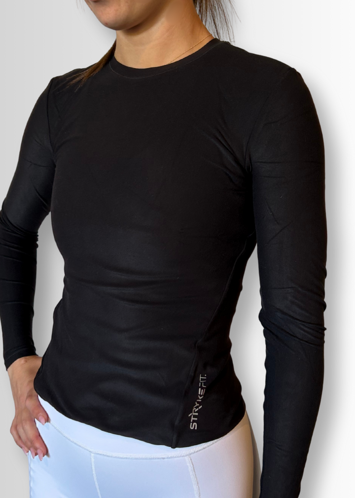 IGNITE LS TOP

Engineered for movement, built for comfort — the INGNITE LS TOP is your go-to layer for any run. Whether you're warming up, or layering post-run, this is the perfect top

Made from ultra-soft, Nylon fabric, it offers just the right amount of warmth and support without sacrificing breathability.&nbsp;



• Slimline fit that won't restrict movement

Double layer body

• Soft comfortable, moisture wicking fabric&nbsp;

• Reflective branding

• Fabric: 85% Nylon / 15% Elastane