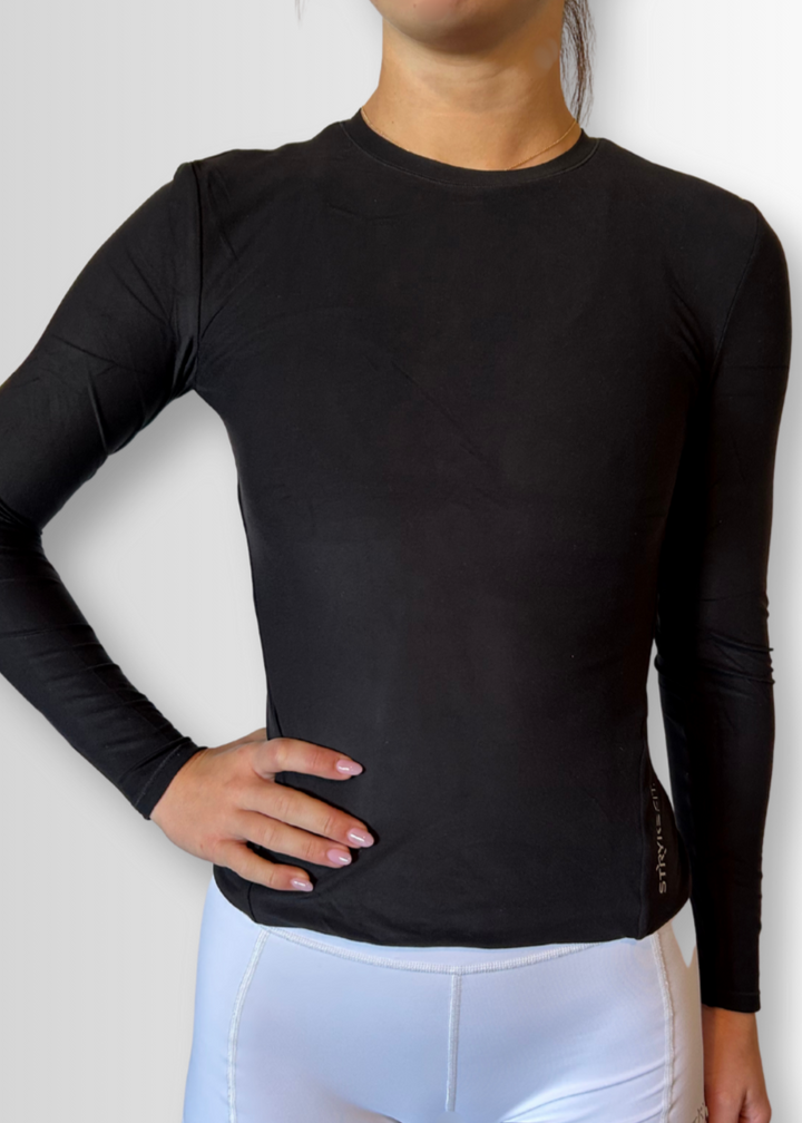 IGNITE LS TOP

Engineered for movement, built for comfort — the INGNITE LS TOP is your go-to layer for any run. Whether you're warming up, or layering post-run, this is the perfect top

Made from ultra-soft, Nylon fabric, it offers just the right amount of warmth and support without sacrificing breathability.&nbsp;



• Slimline fit that won't restrict movement

Double layer body

• Soft comfortable, moisture wicking fabric&nbsp;

• Reflective branding

• Fabric: 85% Nylon / 15% Elastane