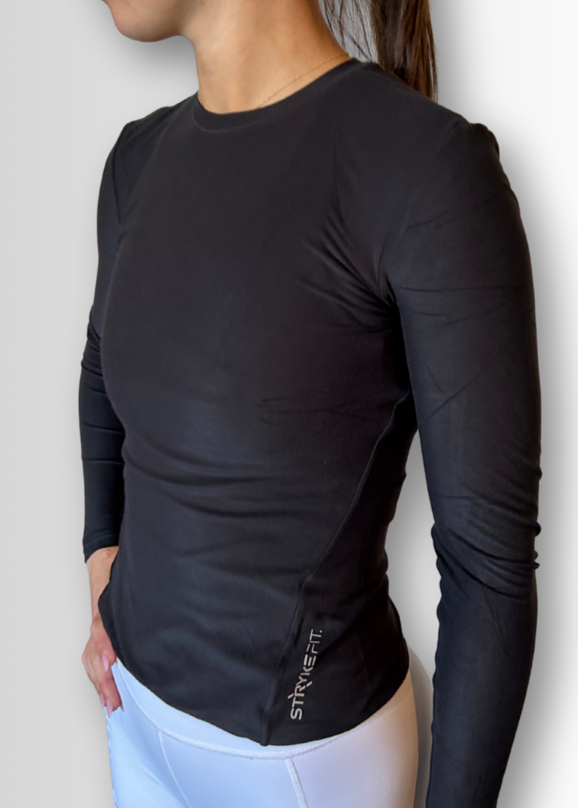 IGNITE LS TOP

Engineered for movement, built for comfort — the INGNITE LS TOP is your go-to layer for any run. Whether you're warming up, or layering post-run, this is the perfect top

Made from ultra-soft, Nylon fabric, it offers just the right amount of warmth and support without sacrificing breathability.&nbsp;



• Slimline fit that won't restrict movement

Double layer body

• Soft comfortable, moisture wicking fabric&nbsp;

• Reflective branding

• Fabric: 85% Nylon / 15% Elastane