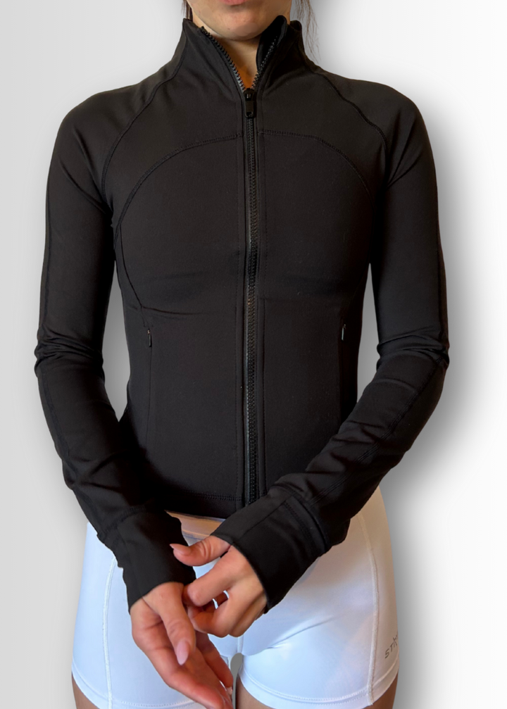 The jacket that goes the distance.

Engineered for movement, built for comfort — the Strydeform Zip Through Jacket is your go-to layer for any run, with a slimline fit that contours without restricting movement. Whether you're warming up, layering post-run, or pushing through a chilly morning session, it's got you covered.

Made from ultra-soft, compressive fabric, it offers just the right amount of warmth and support without sacrificing breathability.