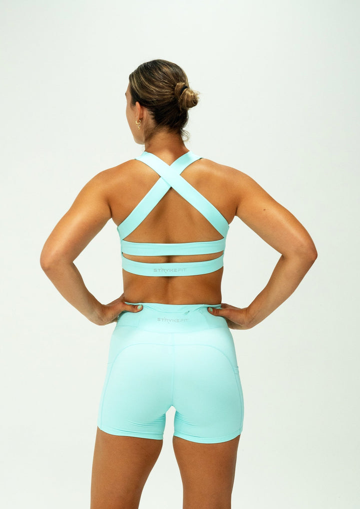 The SF ELITE CROP TOP is designed with cross-over back straps complementing the curve of your shoulder blades and allowing your arms to move freely while offering maximum support. This crop top is supportive, functional, and looks amazing on; the perfect crop top for any running session.