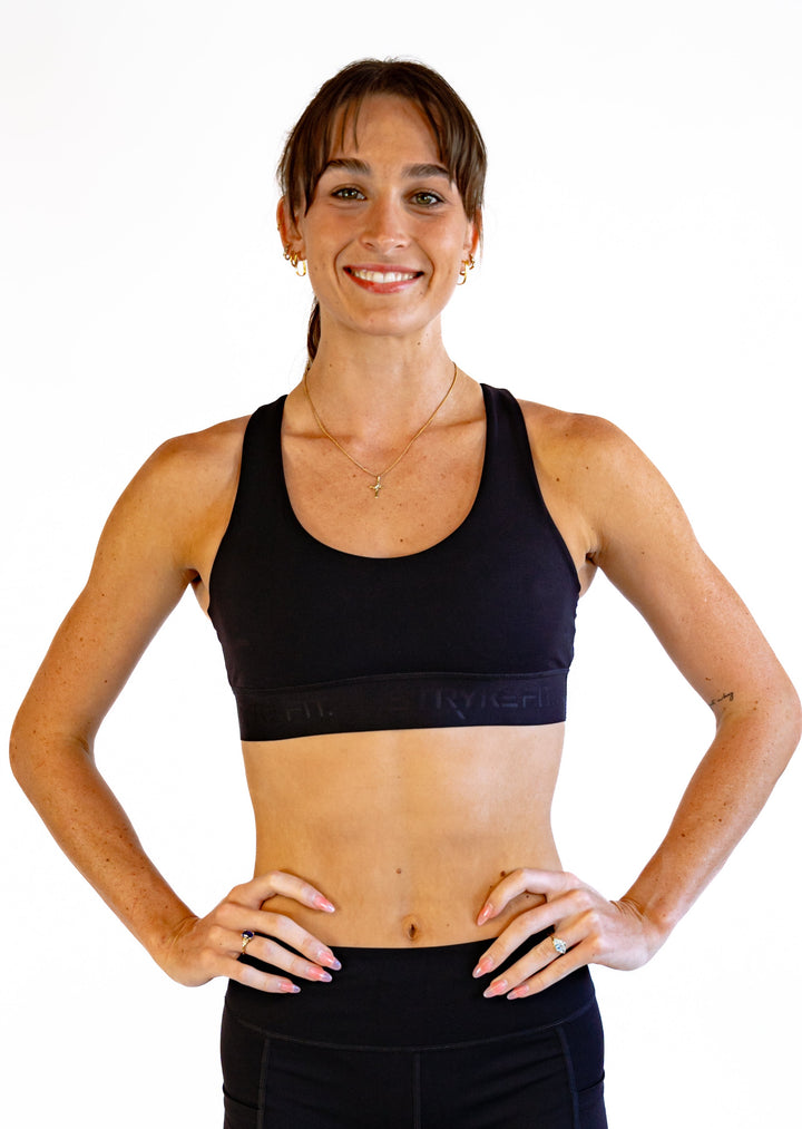 The FIT CROP TOP is designed with a back phone pocket enabling you to store your phone comfortably. Listening to music, podcasts, or even just having your phone with you for personal security is a bonus on any run. The racerback straps follow the curve of your shoulder blades to allow your arms to move freely while offering maximum support.