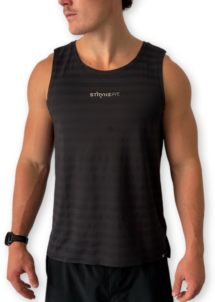 ELEVATE RUNNING SINGLET—purpose-built for anyone aiming to reach their running goals. From elite athletes to everyday runners, this singlet has been tested and proven as a performance essential. Made with ultra-lightweight micro-mesh stripe fabric, wider shoulders, and a fully bonded hem, it delivers unmatched airflow and a weightless feel. Designed for comfort and endurance, the ELEVATE RUNNING SINGLET is ready to elevate you on your next run.