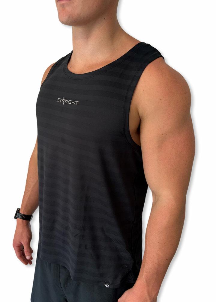 ELEVATE RUNNING SINGLET—purpose-built for anyone aiming to reach their running goals. From elite athletes to everyday runners, this singlet has been tested and proven as a performance essential. Made with ultra-lightweight micro-mesh stripe fabric, wider shoulders, and a fully bonded hem, it delivers unmatched airflow and a weightless feel. Designed for comfort and endurance, the ELEVATE RUNNING SINGLET is ready to elevate you on your next run.