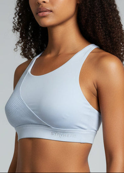 Woman wearing a light blue crop top and jeans against a plain background.
The ACTIVE CROP TOP is designed for runners who value freedom, comfort, and effortless performance.

Cross-over back straps follow the natural curve of your shoulder blades, allowing unrestricted arm movement and a natural feel through every stride. Lightweight and streamlined, this crop moves with you from warm-up to final sprint — so you
