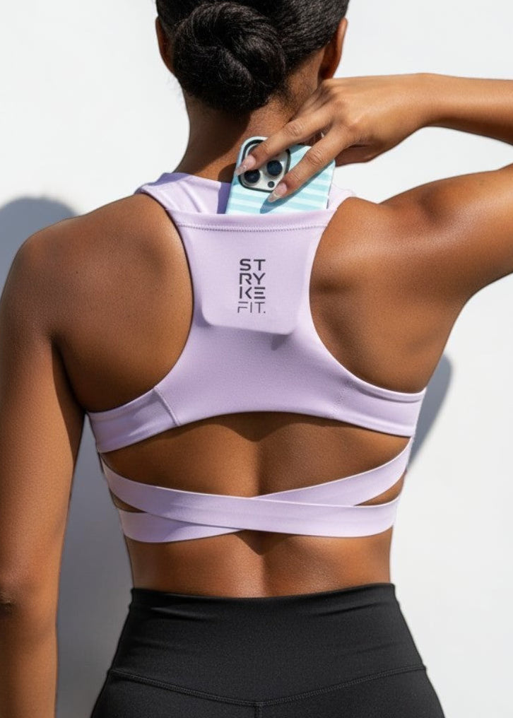 The ATHLETE CROP TOP features a discrete back pocket, keeping your essentials close, whether it's your phone, gels, keys, or anything you need to go the distance without distractions.

The performance racerback design follows the natural line of your shoulders, allowing unrestricted movement and complete freedom through every stride. Engineered for support without compromising comfort