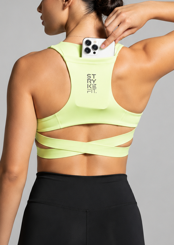 The ATHLETE CROP TOP features a discrete back pocket, keeping your essentials close, whether it's your phone, gels, keys, or anything you need to go the distance without distractions.

The performance racerback design follows the natural line of your shoulders, allowing unrestricted movement and complete freedom through every stride. Engineered for support without compromising comfort, it delivers a secure fit that moves with your body on every run.