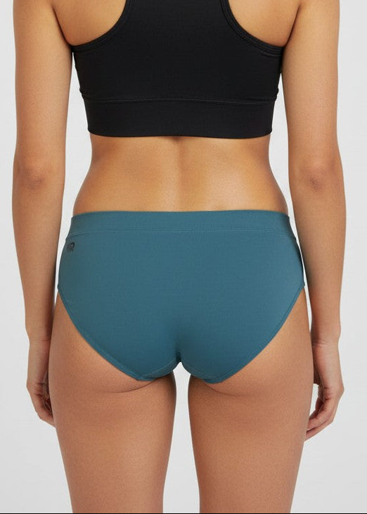 The ENERGY RUNNING BRIEFS are for athletes that want to take their performance to the next level. Engineered for speed and built for peak performance, these briefs will give you the ultimate edge on race day.A woman modeling racing briefs in a purple and dark purple striped pattern with gold 'STRYKEFIT' branding.