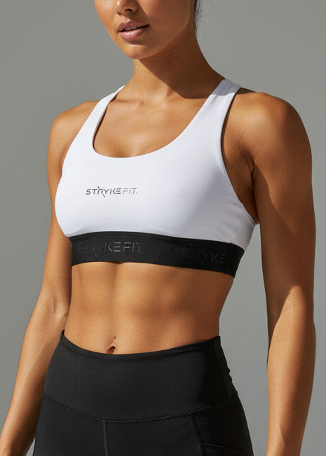 The FIT 2.0 CROP TOP is a new version of our most popular style, this crop has a discreet back pocket to stash your phone, gels, or any running essentials.&nbsp;

The racerback design follows the natural line of your shoulders, unlocking full arm mobility while delivering uncompromising support. Lightweight, breathable, and made to move with you from the first step to the final sprint.