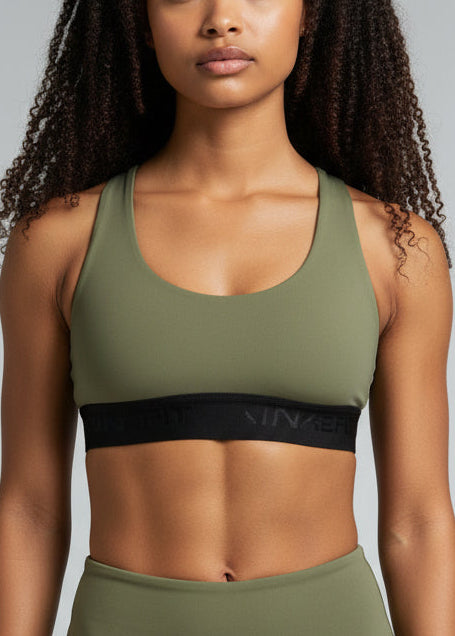 FIT CROP TOP

The FIT CROP TOP is your go-to for every run, with a discreet back pocket to stash your phone, gels, or any running essentials.&nbsp;

The racerback design follows the natural line of your shoulders, unlocking full arm mobility while delivering uncompromising support. Lightweight, breathable, and made to move with you from the first step to the final sprint