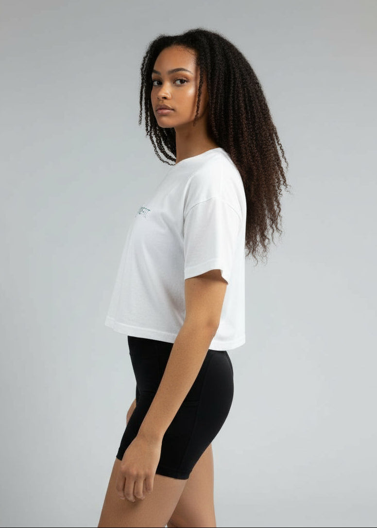 Woman wearing a white t-shirt and black shorts on a plain background
Your easy go to tee, done right.

The Focus Crop Tee is designed to pair effortlessly with all your Stryke activewear — perfect for gym sessions, or everyday wear.

Featuring a classic cropped silhouette and crafted from soft, breathable cotton, it delivers all-day comfort without feeling restrictive. Easy to style and even easier to wear, this is the piece you’ll reach for everytime.