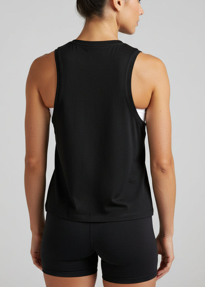 Woman wearing a black tank top and shorts with 'STRYKE FIT' logo on a light gray background.
The Jogging Singlet is made for runners who value comfort and consistency.

A dependable style you can throw on and trust for everyday runs, training sessions, and the miles in between.