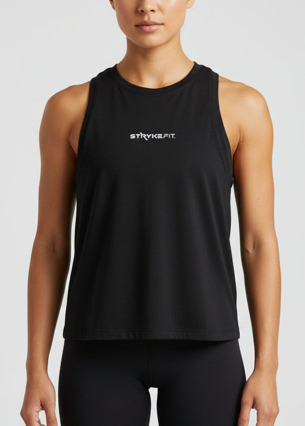 Woman wearing a black tank top and shorts with 'STRYKE FIT' logo on a light gray background.
The Jogging Singlet is made for runners who value comfort and consistency.

A dependable style you can throw on and trust for everyday runs, training sessions, and the miles in between.