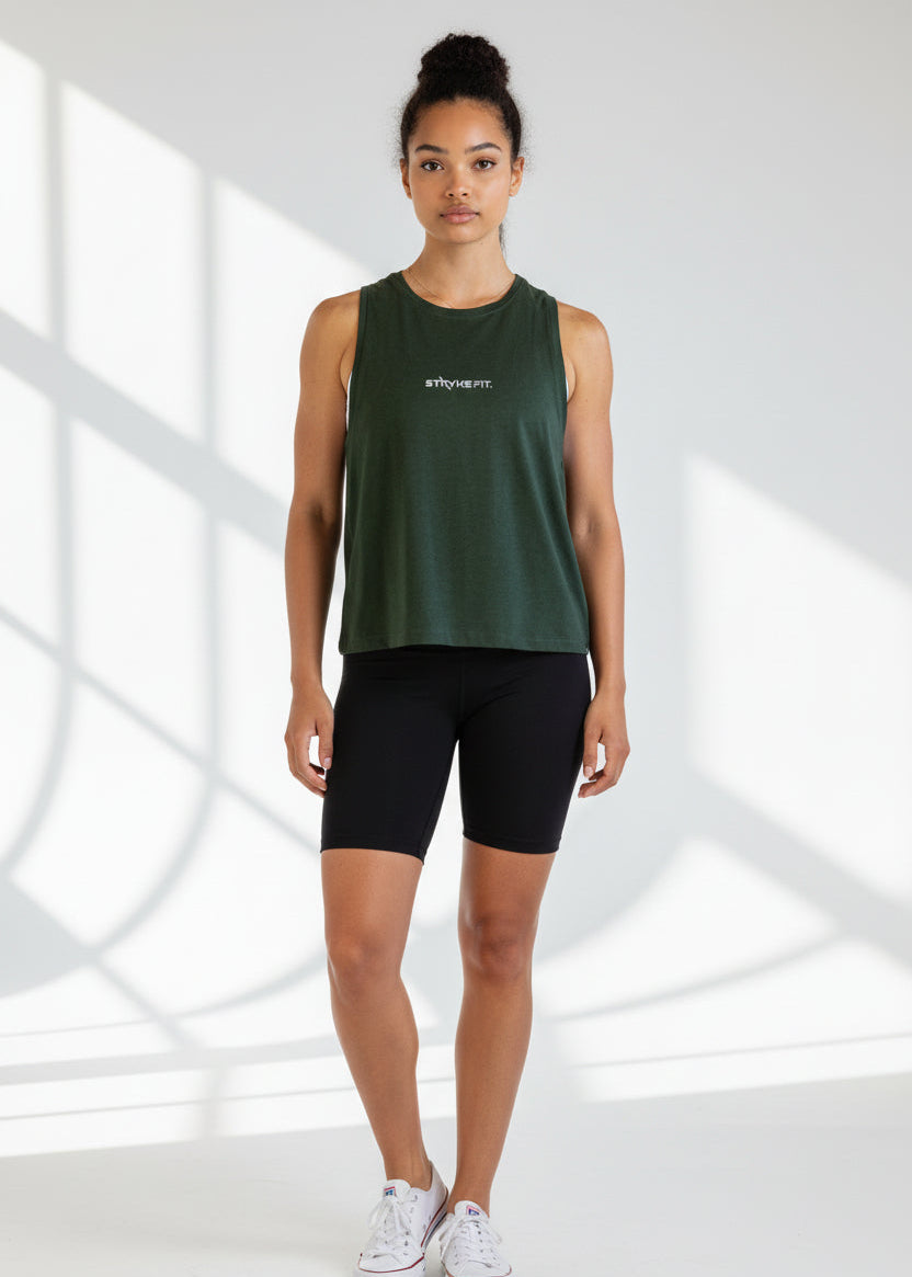 Woman wearing a black tank top and shorts with 'STRYKE FIT' logo on a light gray background.
The Jogging Singlet is made for runners who value comfort and consistency.

A dependable style you can throw on and trust for everyday runs, training sessions, and the miles in between.