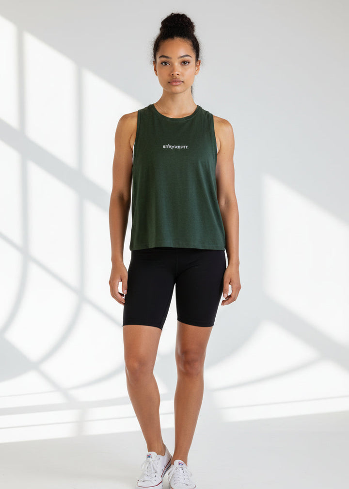 Woman wearing a black tank top and shorts with 'STRYKE FIT' logo on a light gray background.
The Jogging Singlet is made for runners who value comfort and consistency.

A dependable style you can throw on and trust for everyday runs, training sessions, and the miles in between.