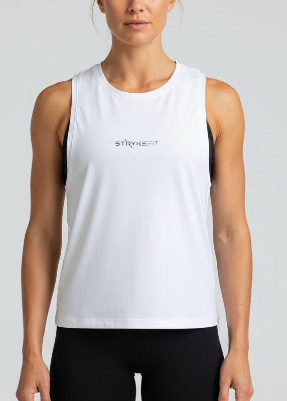 Woman wearing a black tank top and shorts with 'STRYKE FIT' logo on a light gray background.
The Jogging Singlet is made for runners who value comfort and consistency.

A dependable style you can throw on and trust for everyday runs, training sessions, and the miles in between.