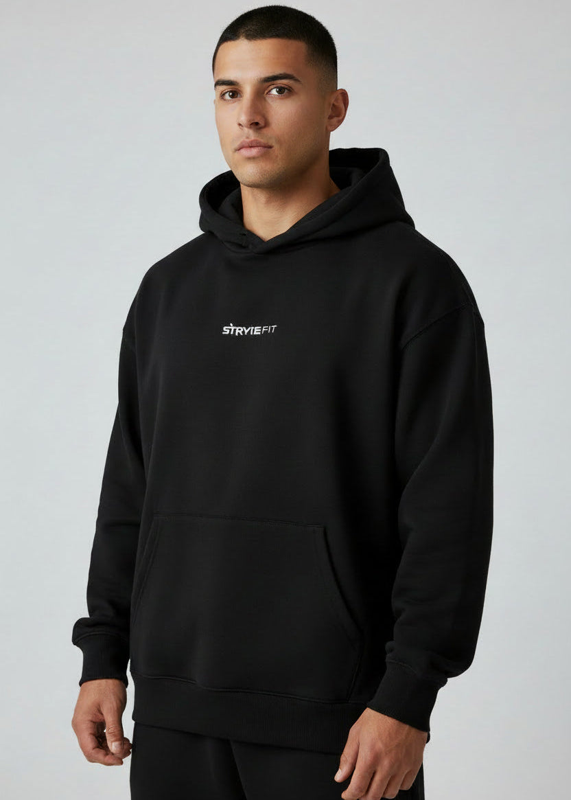 Man wearing a black hoodie with a logo on a gray background.
Made for life around your training session or long runs.

The SF Hooded Fleece is made from premium brushed-back fleece that's easy to wear all day.

Designed to work just as well post-run as it does on the street, it’s the hoodie you grab for early mornings, coffee runs, travel days, or winding down after training. Effortless, versatile, and clean in design — it layers perfectly over your Stryke kit or with your everyday wardrobe.