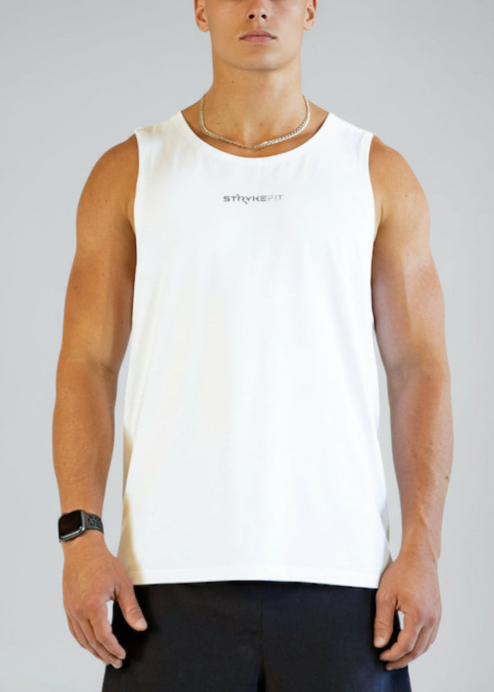 Man wearing a white sleeveless shirt and black shorts on a gray background.

Extend your running potential in our STRIDE SINGLET.&nbsp;If you're striving to achieve your personal goals, this is the singlet for you. Designed with wider shoulders for maximum comfort, it's here to support you every step of the way on your running journey.