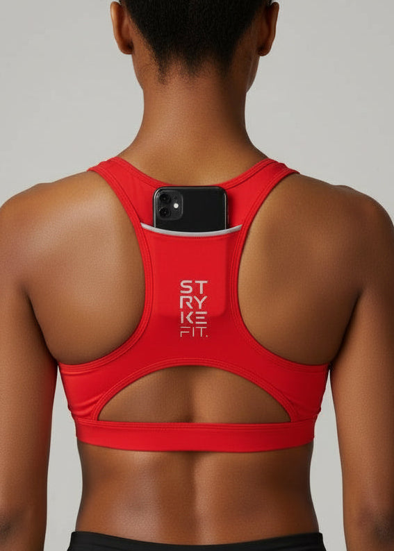 The STRYKE Crop Top is engineered for runners who don’t want distractions — just performance.

Designed with a functional back pocket to carry your phone, gels or essentials on any run. The racerback design mirrors the natural movement of your shoulder blades, allowing unrestricted arm movement while delivering support where it counts.