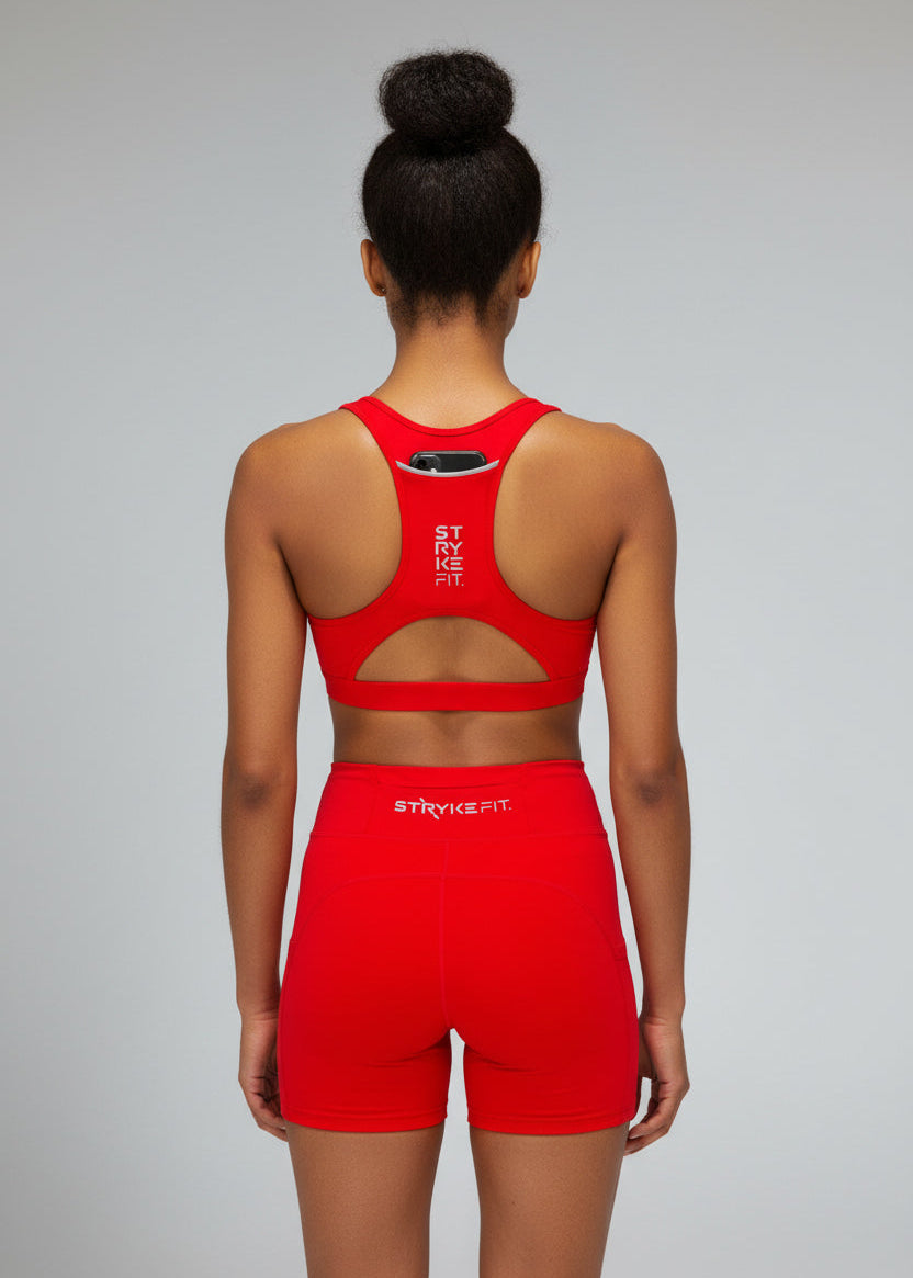 The STRYKE Crop Top is engineered for runners who don’t want distractions — just performance.

Designed with a functional back pocket to carry your phone, gels or essentials on any run. The racerback design mirrors the natural movement of your shoulder blades, allowing unrestricted arm movement while delivering support where it counts.