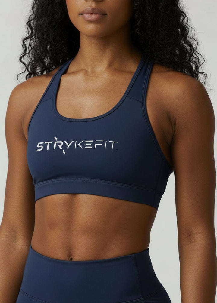 Built to move when you do.


The STRYKE Crop Top is engineered for runners who don’t want distractions — just performance.

Designed with a functional back pocket to carry your phone, gels or essentials on any run. The racerback design mirrors the natural movement of your shoulder blades, allowing unrestricted arm movement while delivering support where it counts.