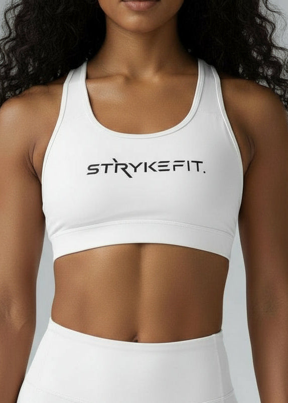 Built to move when you do.

The STRYKE Crop Top is engineered for runners who don’t want distractions — just performance.
Designed with a functional back pocket to carry your phone, gels or essentials on any run. The racerback design mirrors the natural movement of your shoulder blades, allowing unrestricted arm movement while delivering support where it counts.
