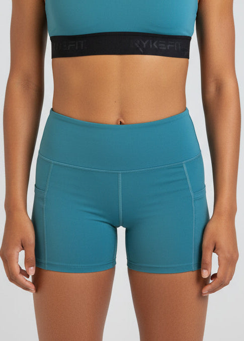 The SURGE 4" Run Short is your everyday running staple — designed for comfort, support, and effortless movement. Lightweight and breathable, it’s built to move naturally with your stride, so nothing holds you back.

Functional leg pockets give you a practical place to carry your phone, gels or your essentials. The 4" length offers the right balance of coverage and freedom, making it a go-to for training runs, long runs, and everything in between.