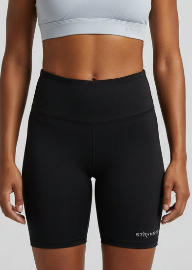 Woman wearing a light gray sports bra and black high-waisted shorts on a plain background. The&nbsp;ZERO 6” SHORT is the ultimate staple piece for runners of all levels. These shorts are made from lightweight fabric and are designed for comfort and exceptional mobility. With seamless sides, front, waist and leg hem, these shorts are design to feel ultra light weight and give no you distractions.

Lightweight, quick-dry, and breathable fabric
Moisture-wicking technology
Reflective logo to enhance 