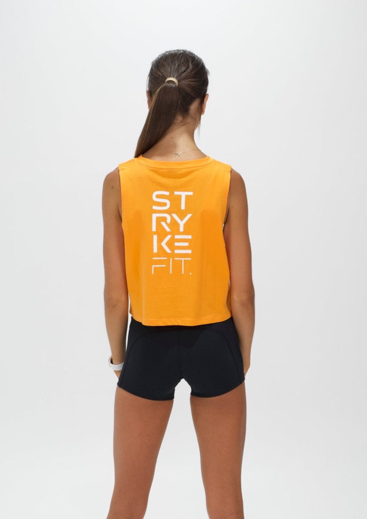 The TEAM CROP TANK is the perfect top for all your fitness needs. Featuring dropped armholes, a cropped length, and a relaxed fit. Whether you're going to the gym, for a walk or coffee you'll love this crop tee. The back view features a large print.