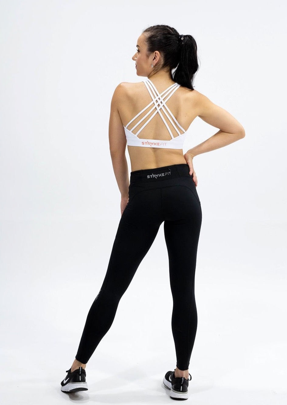INSPIRE RUNNING CROP TOP has been designed with featured multi cross back straps. This crop top is for the girl who likes to look good while running or working out in a medium impact top. With a reflective back logo print you can be seen while running in low light.