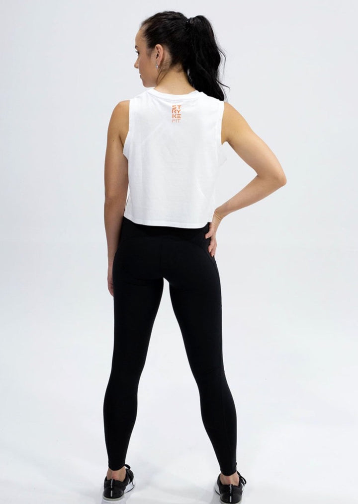 SQUAD SLEEVELESS TANK is made from a soft combed cotton jersey and featuring a crop tank style, this garment will become your next fav. The SQUAD SLEEVELESS TANK is offered in Peacock Green, White, Lilac and Tangerine.