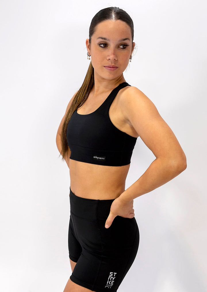 CROSS CROP TOP has been designed with featured multi cross back straps. This crop top is for the girl who likes to look good while running or working